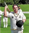  ??  ?? Michael Papps celebrates his triple century during Wellington’s match against Auckland last year.