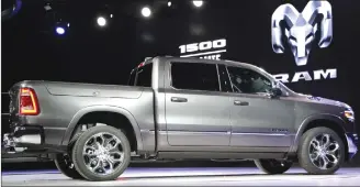  ??  ?? The 2019 Ram 1500 at the North American Internatio­nal Auto Show in Detroit. Ram shook up the truck world a decade ago with a new rear suspension design that delivered sedan-like ride comfort without sacrificin­g capability. The rivals have since caught...