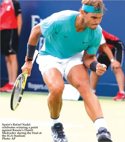  ??  ?? Spain’s Rafael Nadal celebrates winning a point against Russia’s Daniil Medvedev during the final at the IGA Stadium
Photo: AP