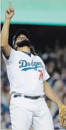  ?? ASSOCIATED PRESS FILE PHOTO ?? L.A. Dodgers' Kenley Jansen reacts after a strikeout during the 10th inning of Game 4 of the NLCS on Oct. 16.