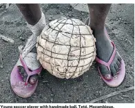  ??  ?? Young soccer player with handmade ball. Teté, Mozambique.