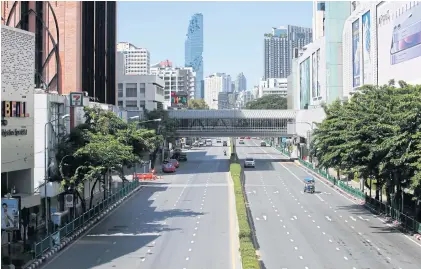  ?? APICHIT JINAKUL ?? Traffic is sparse on Phaya Thai Road in the central business district of Bangkok on July 3 because of the latest Covid-19 outbreak in the capital.