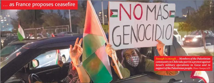  ?? Photo: Nampa/AFP ?? Enough is enough… Members of the Palestinia­n community in Chile take part in a protest against Israel’s military operations in Gaza and in support of the Palestinia­n people.