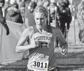  ?? [PHOTO BY K.T. KING, FOR ?? Mustang’s Emma Downing is The Oklahoman’s Girls Cross Country Runner of the Year.