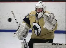  ?? NANCY LANE — BOSTON HERALD ?? St. Mary’s goalie Angelina Catino prepares to make a save in Stoneham on Wednesday. The senior is a major reason St. Mary’s is 16-1 and a girls hockey title contender.