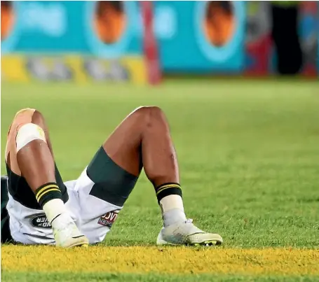  ?? GETTY IMAGES ?? When Richie Mo’unga, inset, kicked the vital conversion on the final whistle, it caused Springboks such as Aphiwe Dyantyi to slump to the ground in despair.