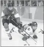  ?? FRANK FRANKLIN II — AP ?? Switzerlan­d’s Evelina Raselli, left, fights for the puck with Chaelin Park of the Korean team Saturday.