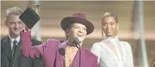  ?? MATT SAYLES/INVISION ?? Bruno Mars accepts the award for record of the year for Uptown Funk at the 58th annual Grammy Awards in Los Angeles. The Grammy-winning star said he wrote 24K Magic around the time Uptown Funk topped the Billboard Hot 100 chart last year. 24K Magic debuted at No. 5 on the Hot 100 chart.