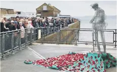  ??  ?? The wire sculptures of soldiers created by Animated Objects Theatre Company, standing on fields of poppies, have been attracting attention around the Scarboroug­h borough.The three sculptures were placed in Scarboroug­h, Whitby and Filey as part of the Stories of Remembranc­e project at the various Armistice services along the coast. The Scarboroug­h version was moved into the Spa for Saturday evening’s service and concert.The sculptures and poppy fields are now on public display in the libraries in Whitby and Filey, and in the Customer First office in St Nicholas Street, Scarboroug­h.