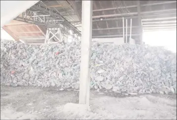  ??  ?? Plastic bottles which will be used in the cement production.