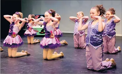  ??  ?? ICONIC ROUTINES: The Dancers Zone junior tap and jazz A students, from left, Sienna Bird, Ella Johns, Emma Gellatly, Adele Joseph, Rahni Rossbotham, Brooke Mccartney and Isobelle Taylor rehearse for Sunday’s Dancing Through The Decades showcase at Horsham Town Hall.