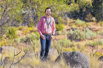  ?? RANDY MONTOYA/SANDIA NATIONAL LABORATORI­ES ?? Dylan Moriarty, a geoscience engineer at Sandia National Laboratori­es, has been named the 2019 Most Promising Engineer or Scientist by the American Indian Science and Engineerin­g Society.