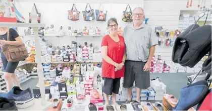  ?? Photo / Warren Buckland ?? Margaret and Garry Mills in their Taradale shoe shop, which is closing down.