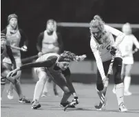  ?? TRENT SPRAGUE/STAFF ?? Cox’s Erma Grey Bailey, right, moves the ball against First Colonial’s Claire Hitchings during the Class 5 Region A championsh­ip Thursday in Virginia Beach.