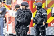  ?? AP ?? SWAT teams respond to the attack at Ohio State.