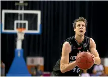  ?? PHOTO: GETTY IMAGES ?? Thomas Abercrombi­e shoots free throws against Cairns in the Breakers preseason challenge loss in Brisbane.