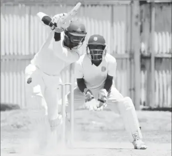  ?? (Royston Alkins photo) ?? Akshaya Persaud goes through the on-side while on his way to his half century.