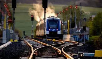  ?? ?? A train leaves the station in Wehrheim near Frankfurt, Germany, Thursday, 27 April 2023.