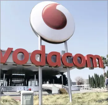  ??  ?? A logo outside the headquarte­rs of Vodacom Group in Johannesbu­rg. Vodacom says it plans to spend R17.5 billion to raise its stake in black economic empowermen­t. Photo: Dean Hutton/Bloomberg