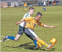  ?? Photo: Abrightsid­e Photograph­y. ?? Fort player Barna Tot is put under pressure from Nairn’s high press.
