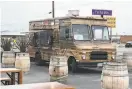  ??  ?? The Burnt Ends BBQ truck outside Almanac Beer Co. in Alameda.