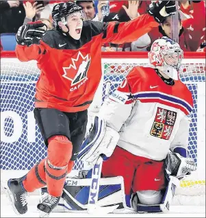  ?? CP PHOTO ?? Canada forward Drake Batherson (19) celebrates his goal on Czech Republic goaltender Josef Korenar (30) during second period of the world junior hockey championsh­ip semifinal game Thursday night in Buffalo, N.Y.