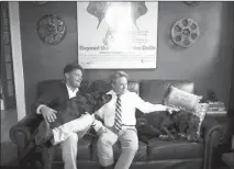  ?? Travis Dove / The New York Times ?? Brad Newton, left, and Frank Slate Brooks sit at home April 15 in Greensboro, N.C., where they were the first gay couple to receive a marriage license. Guilford County has issued more than 300 same-sex licenses since October 2014, but six county...