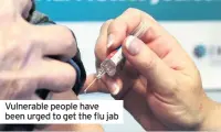  ??  ?? Vulnerable people have been urged to get the flu jab