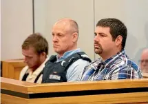  ?? TOM LEE/STUFF ?? Elisha Crammond, left, and Michael Torrington, right, are on trial in the Hamilton District Court.
