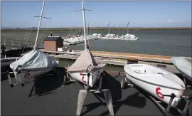  ?? KARL MONDON — STAFF PHOTOGRAPH­ER ?? The Stanford Rowing and Sailing Center is quiet Tuesday, the day the university’s sailing coach John Vandemoer was named in a nationwide college-admissions cheating scandal.