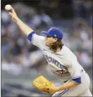  ?? AP photo ?? Blue Jays pitcher Kevin Gausman throws during the first inning of Toronto’s 4-0 win over the New York Yankees on Friday.