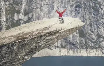  ??  ?? 0 Aron Anderson after his 15-hour climb to Trolltunga, a cliff in southweste­rn Norway