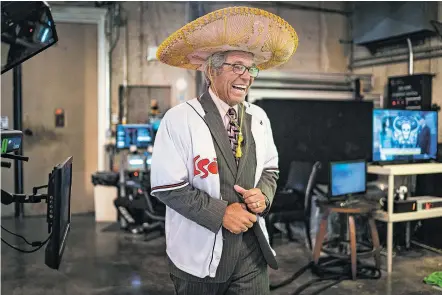  ?? GABRIELA CAMPOS/THE NEW MEXICAN ?? Steve Stucker, weatherman for KOB’s morning news show, laughs after jumping into a fellow broadcaste­r’s segment wearing his mariachi sombrero during the taping of Friday morning’s broadcast. Stucker was celebratin­g being asked to throw out the first pitch at the Albuquerqu­e Isotopes’ home opener. After 33 years of being New Mexico’s favorite weatherman, Stucker is calling it a career.