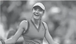  ?? DANIELLE PARHIZKARA­N/USA TODAY SPORTS ?? Emma Raducanu celebrates after match point against Maria Sakkari in the semifinals of the U.S. Open.