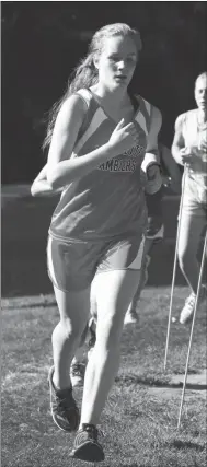  ??  ?? LaFayette runner Casey O’Neill makes the turn during the first race of the Chattanoog­a Cross Country League season this past Thursday at Camp Jordan. (Messenger photo/Scott Herpst)