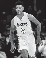  ?? WALLY SKALIJ/TRIBUNE NEWS SERVICE ?? Nick Young reacts after his basket for the Lakers against the Spurs in Los Angeles on Nov. 18, 2016. The Warriors signed Young on a one-year, $5.2 million contract.