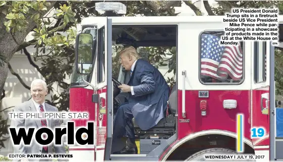  ?? EPA ?? US President Donald Trump sits in a firetruck beside US Vice President Mike Pence while participat­ing in a showcase of products made in the US at the White House on Monday.