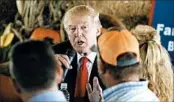  ?? EVAN VUCCI/AP ?? Republican presidenti­al nominee Donald Trump meets with a group of farmers Monday in Boynton Beach, Fla.