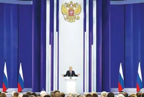  ?? (Dmitry Astakhov, Sputnik, Kremlin Pool Photo via AP) ?? Russian President Vladimir Putin gestures as he gives his annual state of the nation address Tuesday in Moscow, Russia.