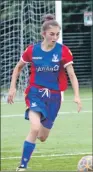  ??  ?? Rising star Erin eases the ball out of defence in a match for Crystal Palace ladies.