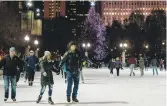  ?? TYLER PASCIAK LARIVIERE/SUN-TIMES FILE ?? Ice skating in Millennium Park.