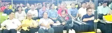  ??  ?? Jamit (seated second right, front), Sempurai (seated right, front), Lau (seated left, front) and others at the launching of the Sibu Jaya ‘rumah asap’ or smokehouse.