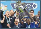  ??  ?? UNBELIEVAB­LE Leicester win the title