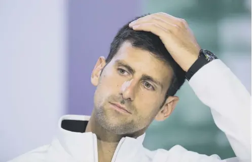  ??  ?? 0 Twelve-time grand slam champion Novak Djokovic has been seeking advice from specialist­s as he bids to recover from an elbow injury.