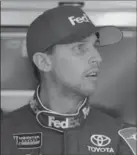  ?? CHUCK BURTON, THE ASSOCIATED PRESS ?? Denny Hamlin is looking for more money, but NASCAR CEO Bill France says that is going to be tough as the sport faces bleak times.