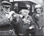  ??  ?? The Goons in costume busking for the crowds in London’s Oxford Street