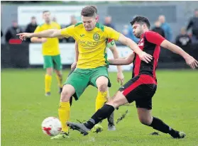  ??  ?? Caernarfon hat-trick man Jamie Breese (yellow)