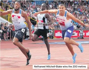  ??  ?? Nethaneel Mitchell-Blake wins the 200 metres