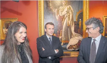  ?? REUTERS ?? French President Emmanuel Macron, Junior Minister in charge of Equality between Men and Women Marlene Schiappa, and Philippe Costamagna, director of the Fesch Museum, as they visit the museum in Ajaccio, Corsica on Tuesday.