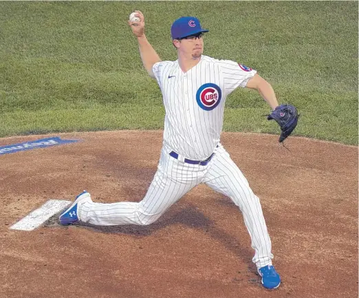  ?? NUCCIO DINUZZO/GETTY IMAGES ?? Right-hander Alec Mills started in place of ailing Tyler Chatwood (back tightness) on Friday against the Brewers and pitched six innings.